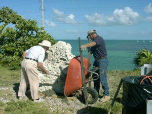 2002 Irving Eyster & Dennis Taylor installing a Heritage Monument Trail plaqce on the fill
