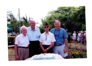 Irving Eyster, Ray Albury, Bernard Russell and Greg Gobel unveiling the plaque at the Hurricane Monument